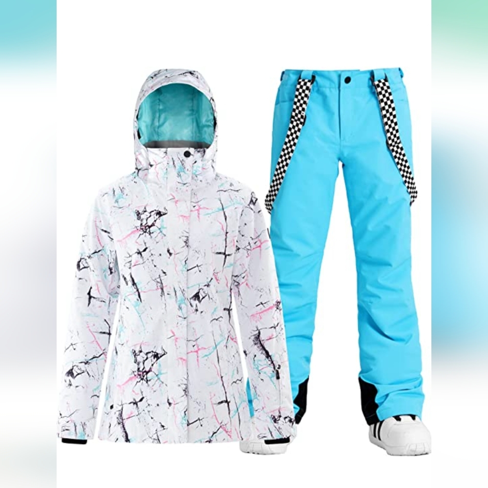 Women's ski/snowboard jacket and pants with adjustable suspenders. New. Size XL.